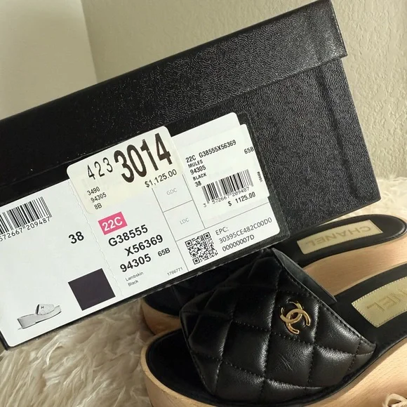 CHANEL Black and Tan Quilted Mules